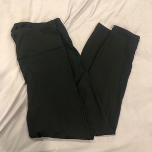 Athleta Ultimate Stash Pockets 7/8 tight leggings